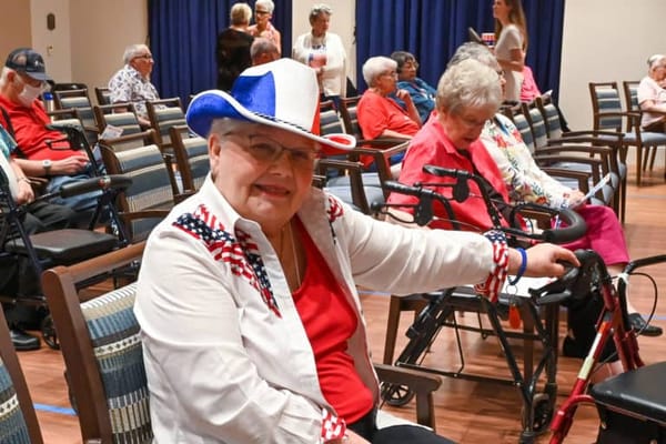 Residents enjoying a social event in a common area