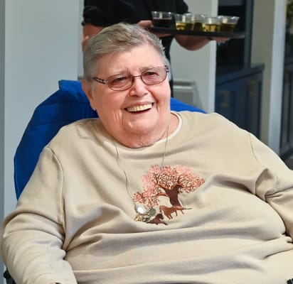 Smiling resident in a common area