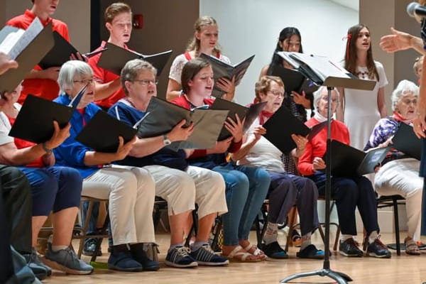 Residents participating in a choir performance