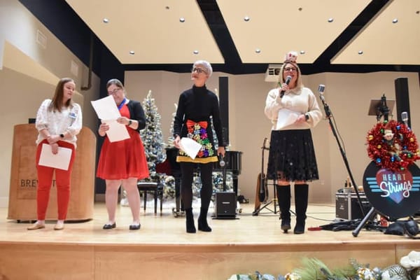 Staff and residents at a Christmas celebration event