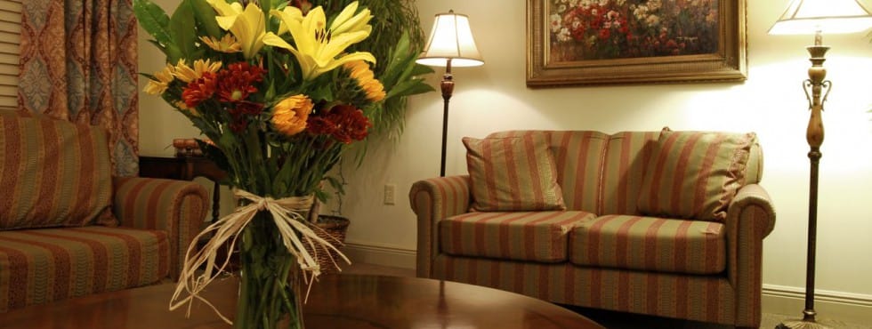 Cozy common area with flowers and seating