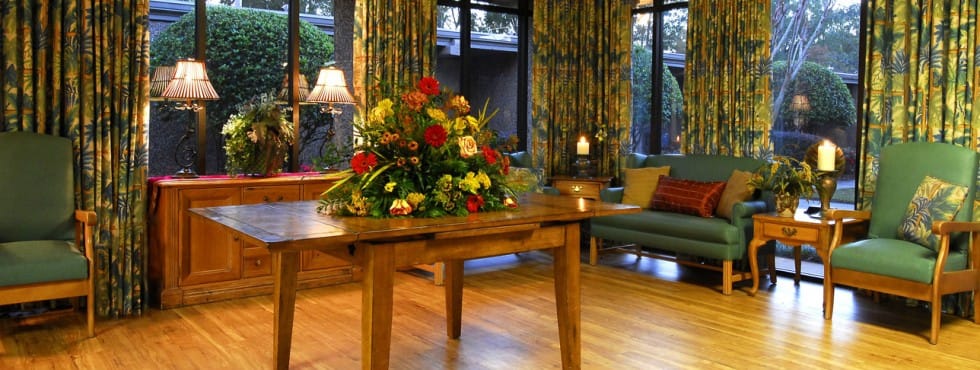 Bright interior common area with floral arrangement