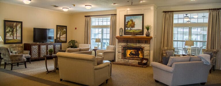 Cozy common area with comfortable seating and a fireplace
