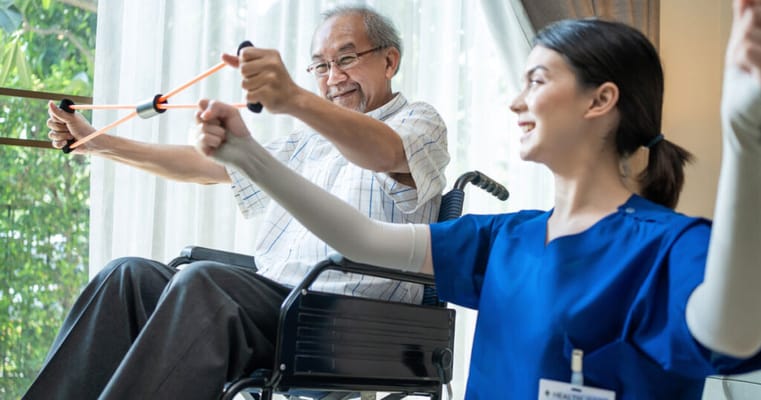 Occupational therapy session with a senior and caregiver