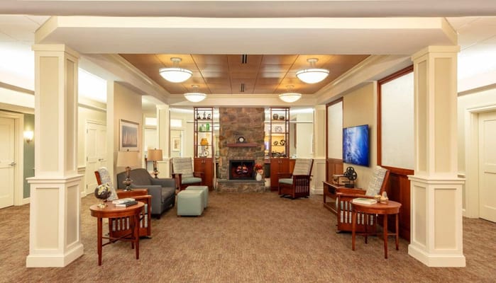 Bright common area with comfortable seating and decor