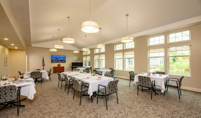 Dining area with tables set for a meal