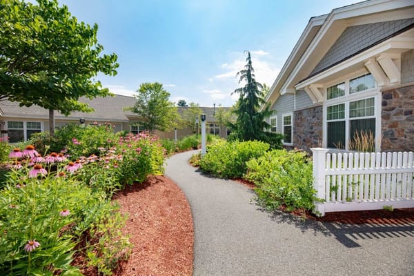 Pathway through a vibrant garden at the facility