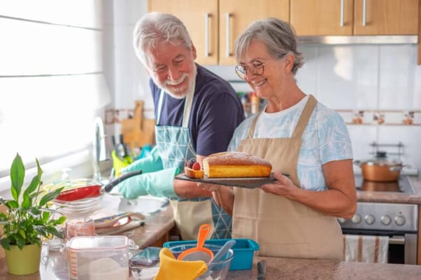 Couple baking together in a cozy kitchen