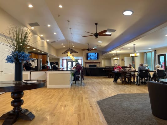 Residents socializing in a spacious common area