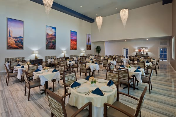 Elegant dining room with tables set for a meal