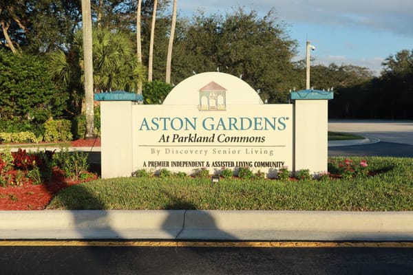 Entry sign for Aston Gardens Assisted Living