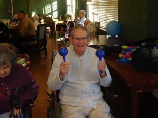 Resident engaged in a room with activities