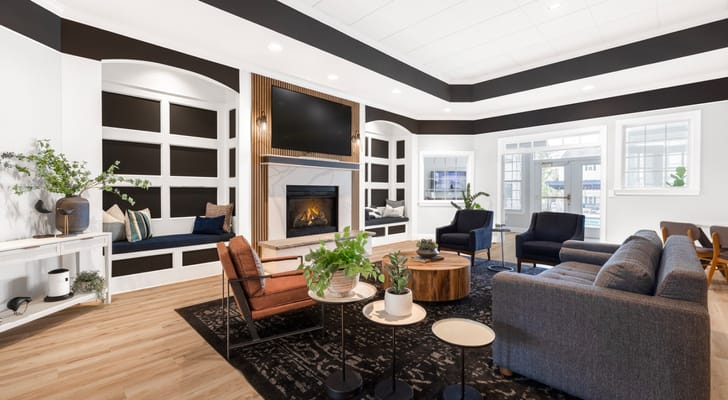 Interior common area with seating and a fireplace