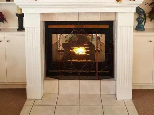 A cozy fireplace in a common area