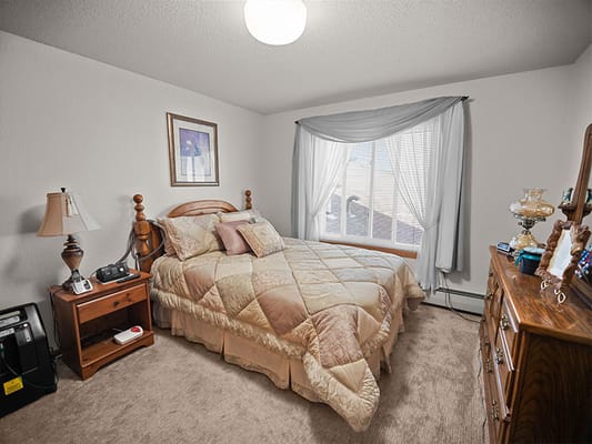 Private bedroom with a bed and window
