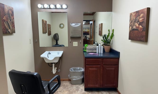 Interior view of a salon area with decor and equipment