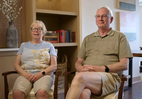 Residents sitting in a cozy lounge area