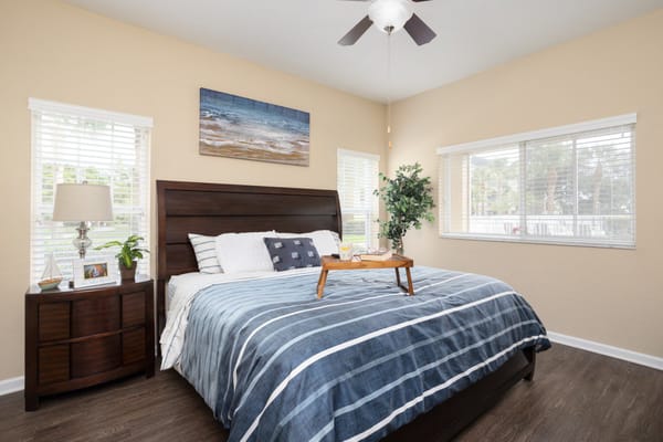 Cozy resident room with a bed and natural light