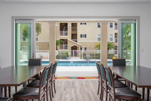 Interior view of a dining area facing the pool