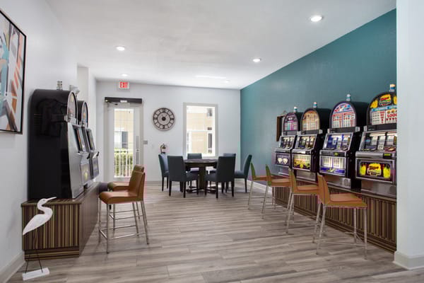 Interior view of a gaming area with slot machines