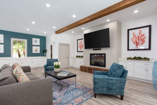 Common area with seating and fireplace