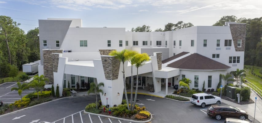 Exterior view of Discovery Village at Westchase with landscaping