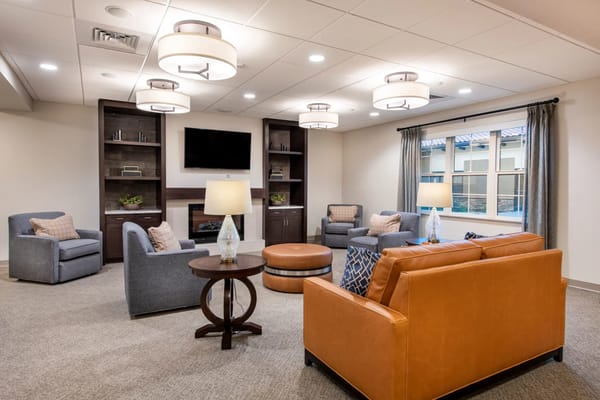 Comfortable common area with seating and lighting