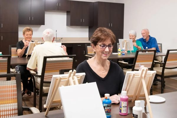 Residents engaging in a painting activity