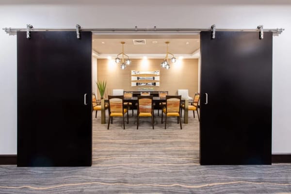 Dining area with sliding doors and modern decor