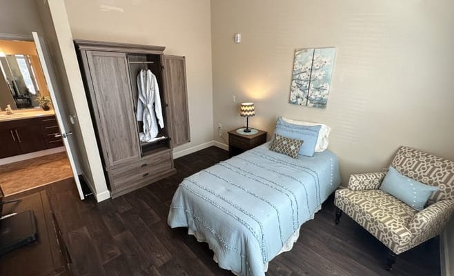 Cozy resident room with bed and furnishing