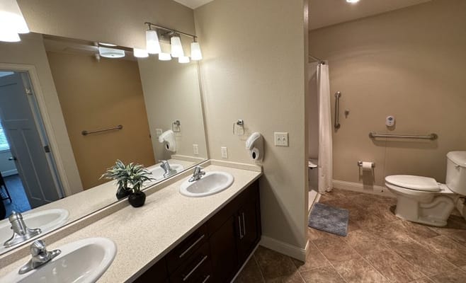 Bright, accessible bathroom in a resident room