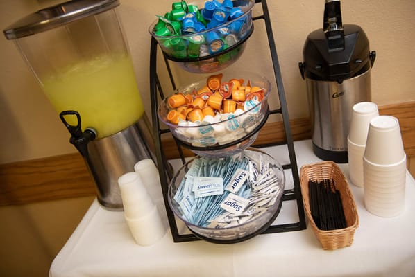 Condiments and drinks displayed at a service station