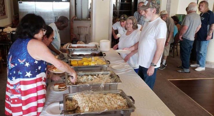 Residents enjoying a meal together in a dining area