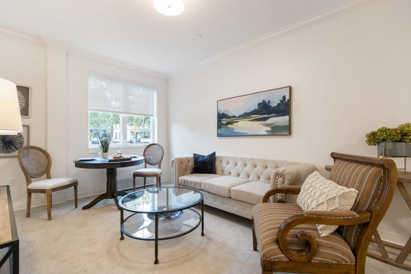 Cozy common area with comfortable seating and artwork