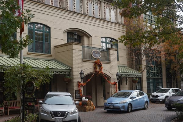 The entrance of Sunrise of Connecticut Avenue with autumn decorations.