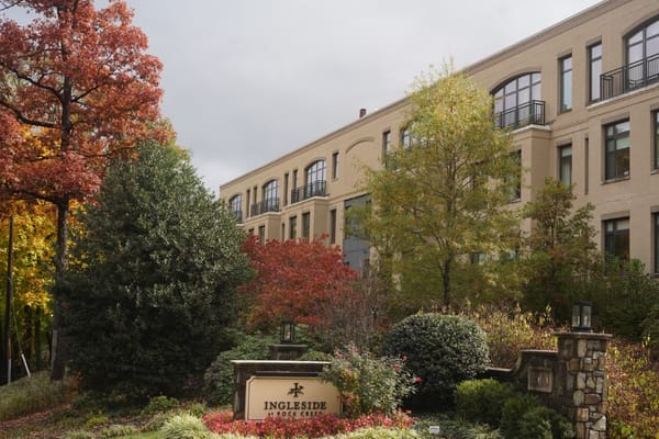 Exterior view of Ingleside at Rock Creek surrounded by gardens