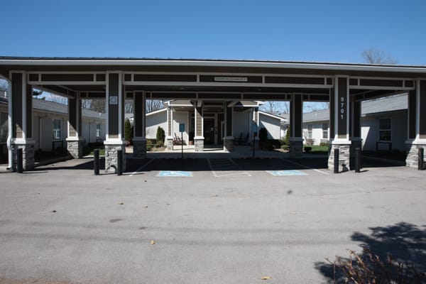 Covered entrance of Creekside on Whipps Mill Road