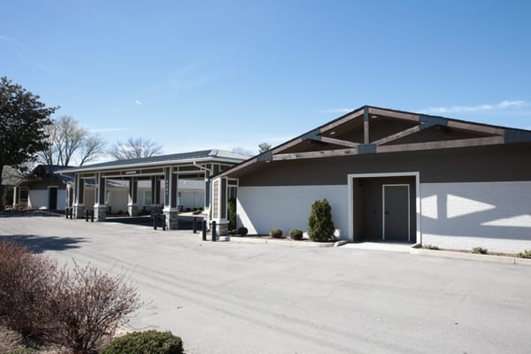 Exterior view of the Creekside facility with landscaped area