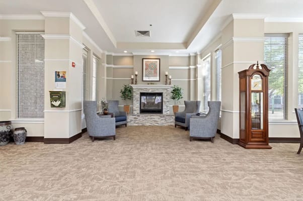 Inviting lobby area with seating and a fireplace