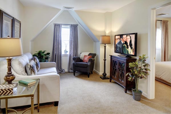 Cozy interior of a private resident room with a TV