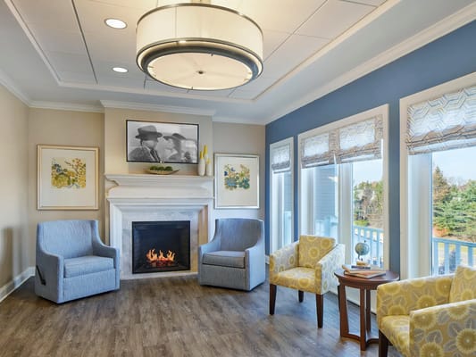 Cozy common area with seating and a fireplace