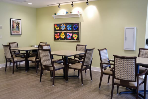 Interior common area with tables and chairs