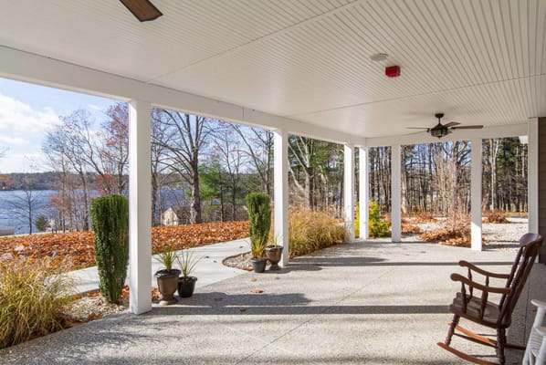 Outdoor patio with lake view at Beaver Lake Lodge