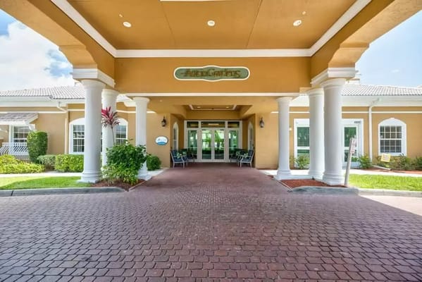 Entrance of a senior living facility with inviting patio