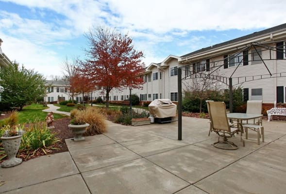 Outdoor courtyard with seating and landscaping