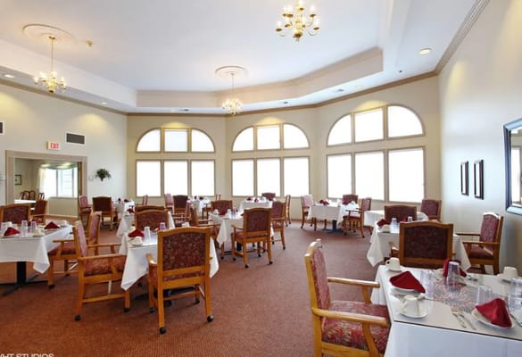 Dining area with tables set for a meal