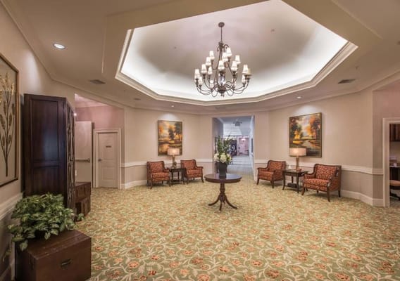 Cozy lobby area with seating and decorative lighting