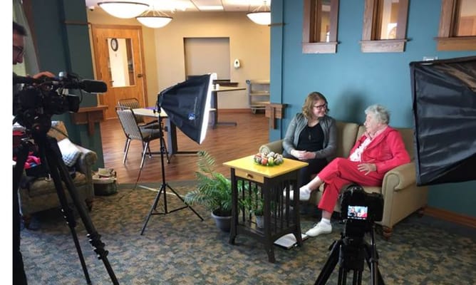 Residents enjoying a conversation in a common area