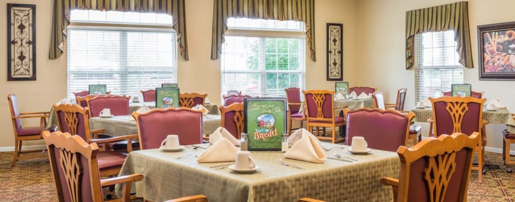 Elegant dining room with neatly set tables