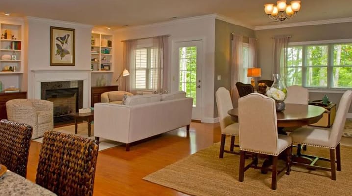 Bright and inviting common area with seating and dining space